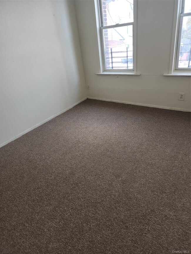 Building Photo - 205-11 Hollis Ave