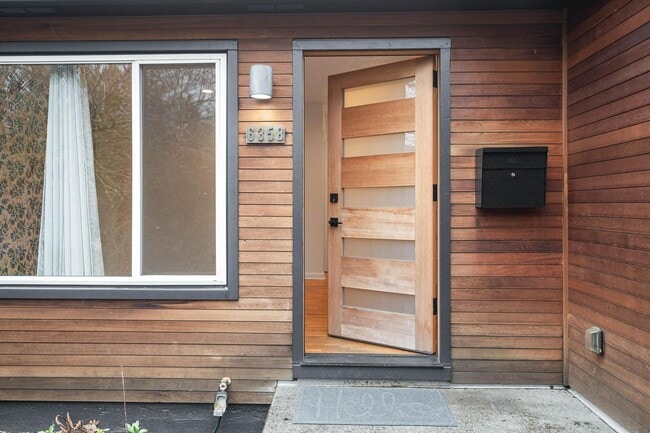 Building Photo - Beautiful, modern 4-bdrm/2-bath home in Concordia—Private, urban sanctuary w/ flex spaces