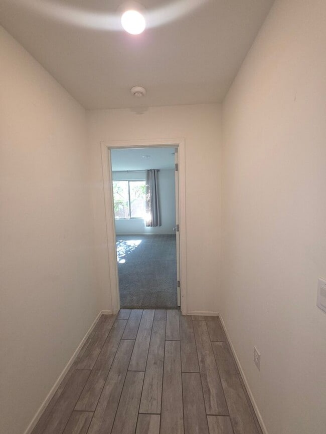 Building Photo - COMING SOON! New 3BR 2 BA Home w/ 2-Car Garage • Stainless Kitchen • Timer-Irrigated Yard in East...