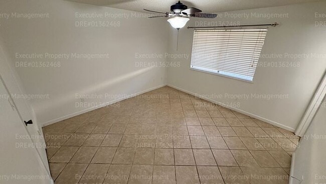 Building Photo - 3 bedroom 2 bathroom home on a corner lot with extra fenced parking.