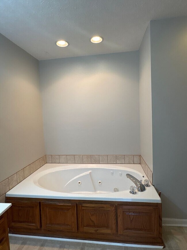 Building Photo - Charming Home with Covered Back Deck and Fenced in Yard...