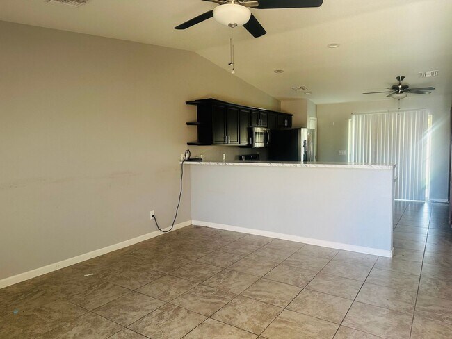 Building Photo - Modern 3-Bedroom Home with Solar Efficiency in Peaceful Mohave Valley Neighborhood