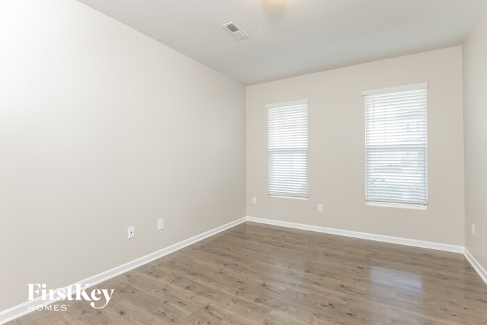 Building Photo - 304 Whispering Wind Way