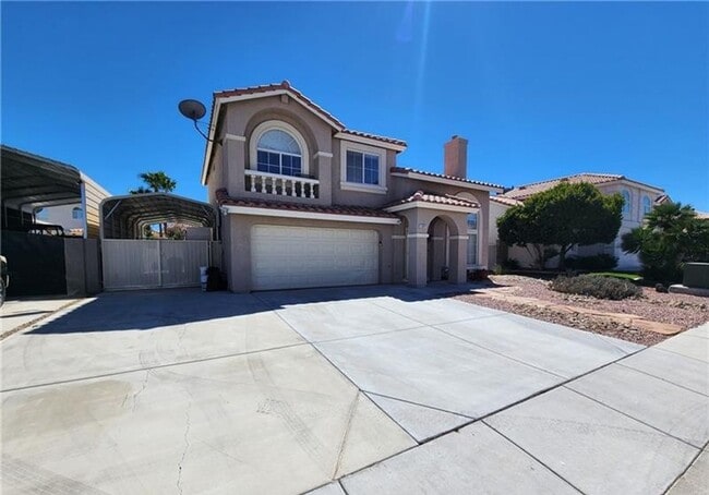 Building Photo - Beautiful two story home with a two car garage, covered RV gate, and dedicated RV parking.