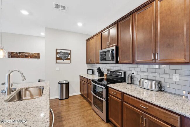 Building Photo - 8638 N Genoa Ct
