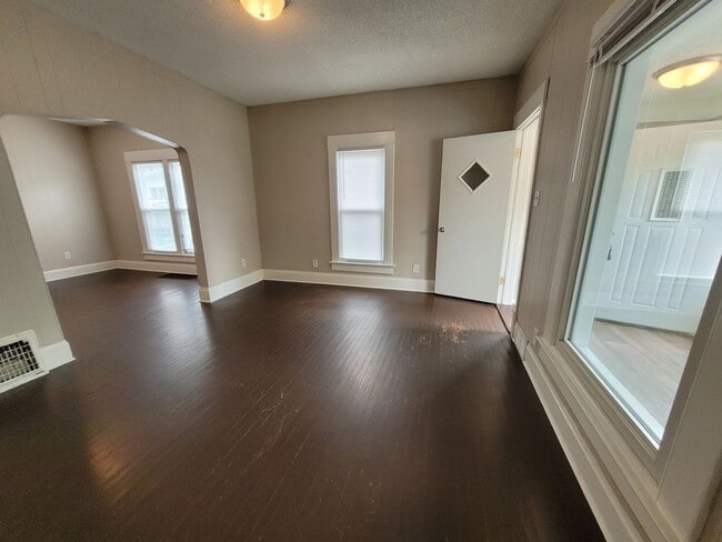 Building Photo - Two bedroom home with partially fenced yard!