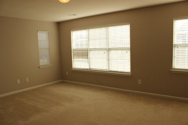 Building Photo - End-Unit Townhouse! Brier Creek Location! ...