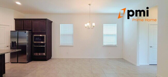 Building Photo - Luxury Living in Winter Garden – 4-Bedroom and 3.5-Bathrooms Home with Screened Patio & EV Charging