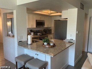 Building Photo - 5665 Trailwinds Dr