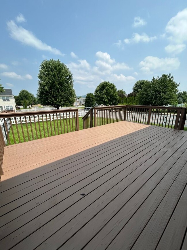 Building Photo - Space, Style - Move-In Ready 4-Bedroom End Unit with Finished Basement & Garage