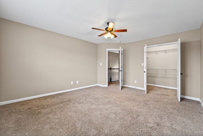 Building Photo - Four Bedroom with Three Car Garage!