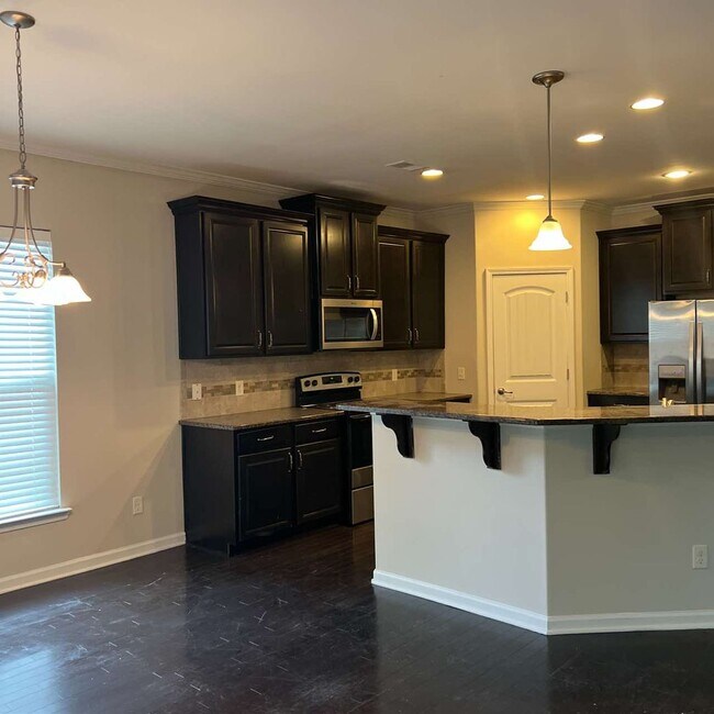 Building Photo - This beautiful 4 bedroom, 2.5 bath home in the highly sought-after Palmetto Pointe neighborhood h...