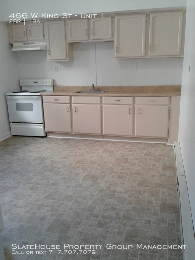 Building Photo - First floor two bedroom with yard!