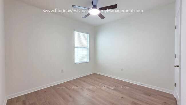 Building Photo - MOVE IN READY ! 4 BEDROOM/2 BATH! TILE- LVP THROUGHOUT! LAWN MOWING INCLUDED!