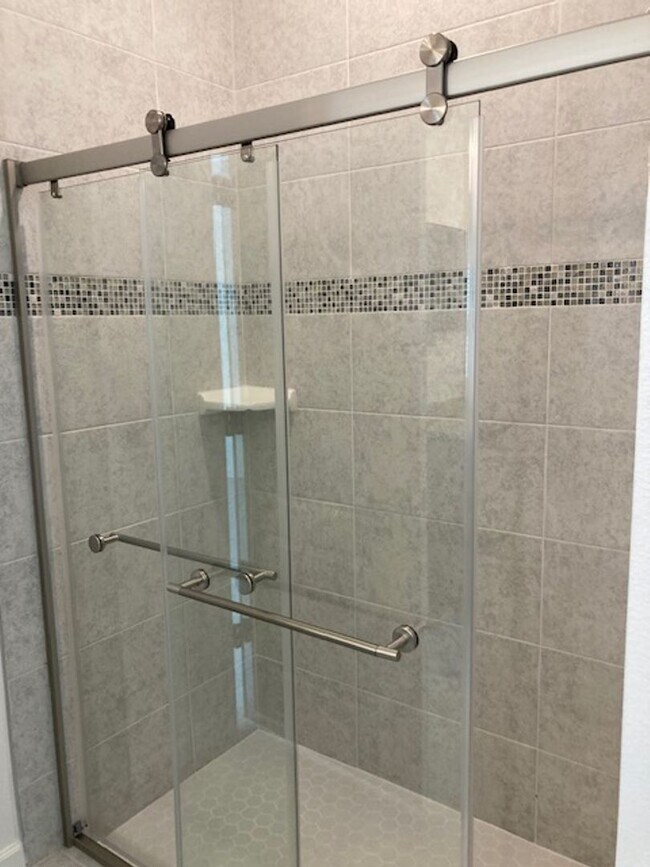 Building Photo - Like New 3 bedroom + den with French doors, screened in porch and Fenced yard and much more...