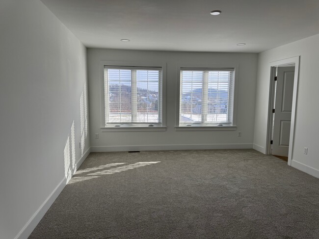 Large main bedroom. Ready for your furniture. - 119 Founders St