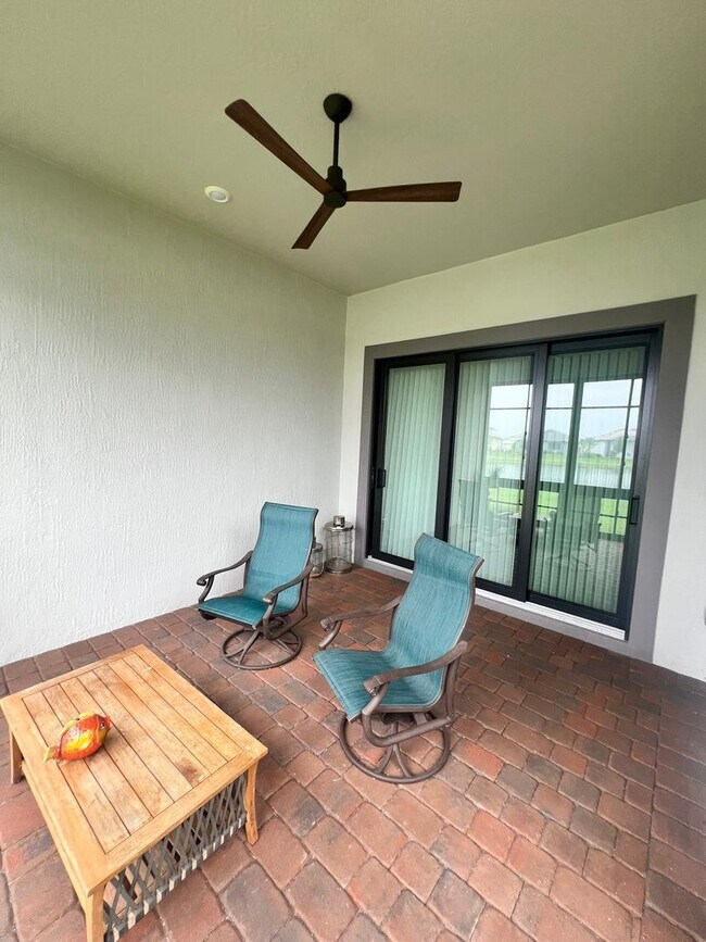 Building Photo - STUNNING LAKEFRONT 3 BEDROOM, 2.5 BATH HOM...