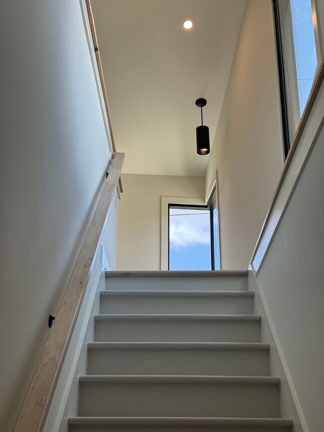 Building Photo - Vaulted Ceilings & Hardwood Floors in This Charming Indianapolis L