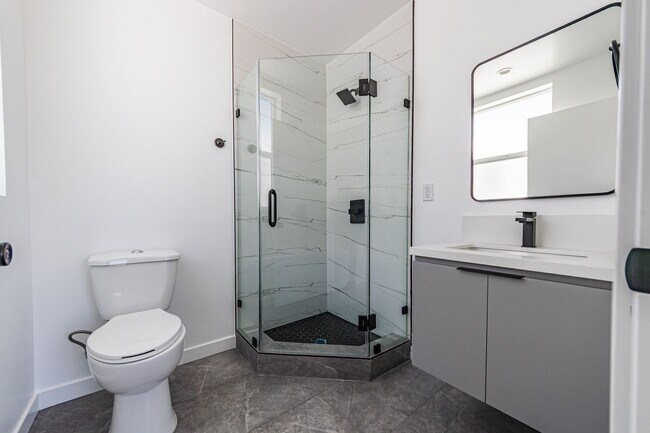 Building Photo - Contemporary 4-Bed, 4.5-Bath Townhome with...