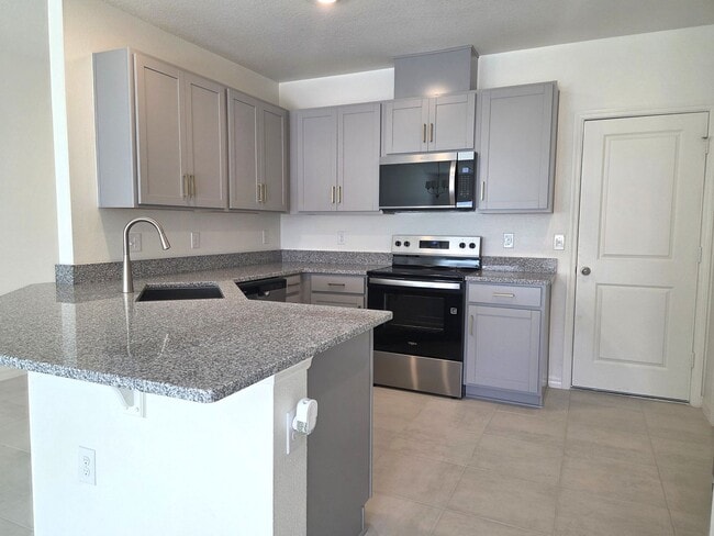 Building Photo - Brand New Townhome in The Sanctuary