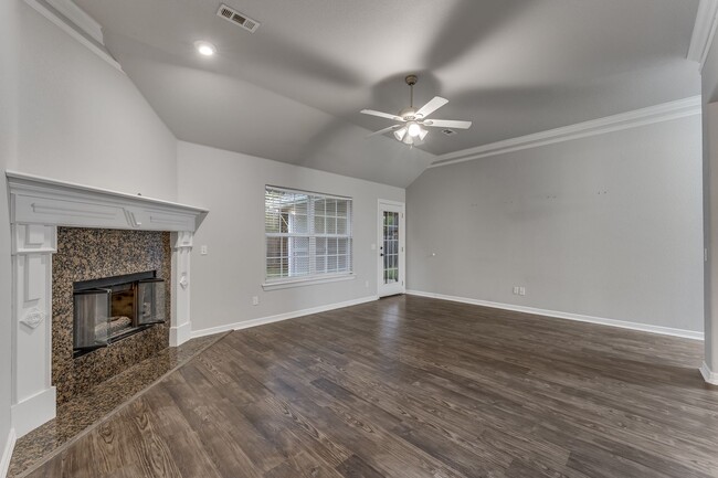 Building Photo - Charming 3-Bedroom Home with Fireplace & A...