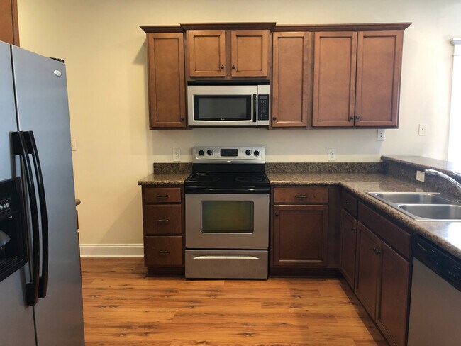 Building Photo - PRE-LEASING FOR AUGUST 2025!