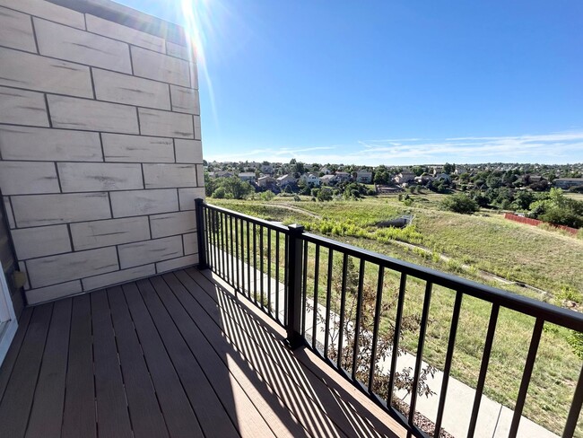 Building Photo - Impressive 4 Bedroom Townhome Nestled in M...