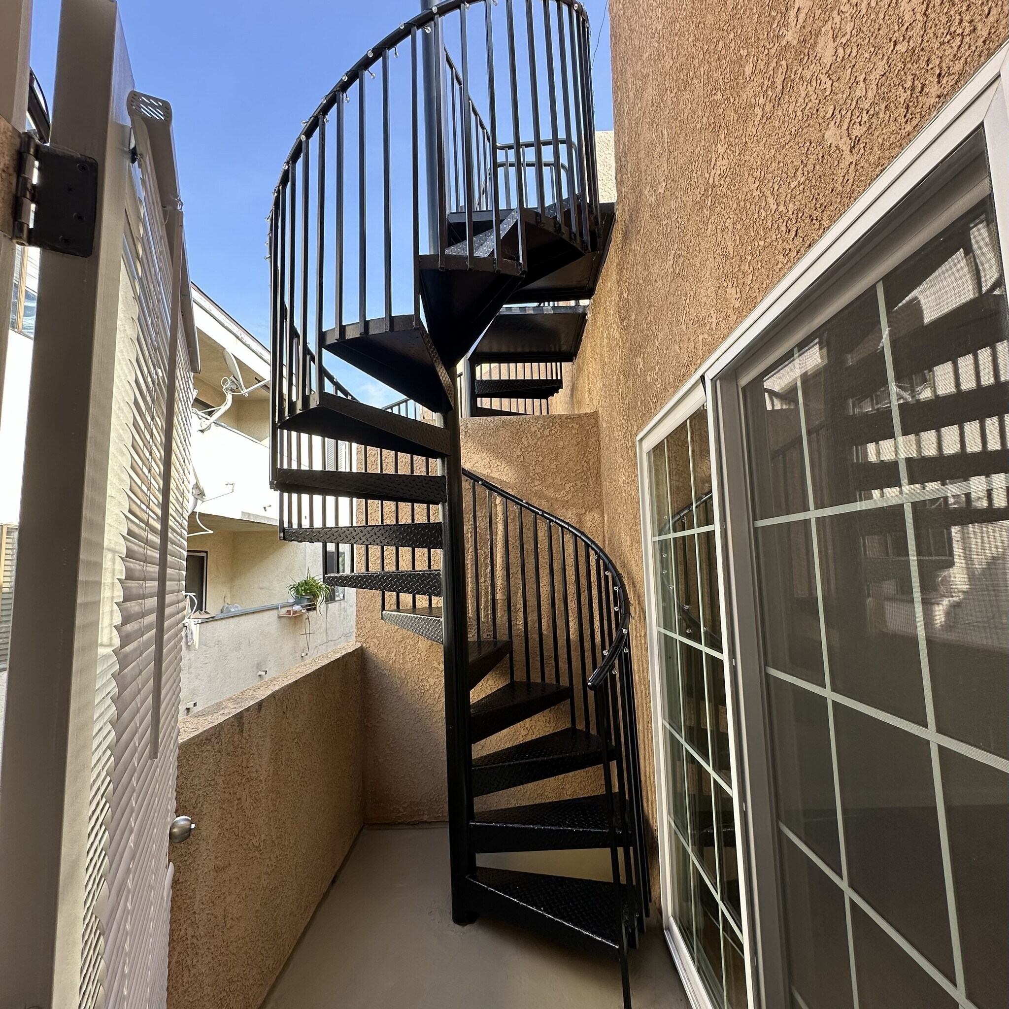 Patio Patio and stairway to rooftop - 1035 Myrtle Ave