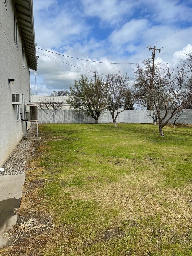 Building Photo - 3 BED 2 BATH W/ATTACHED MOTHER-IN-LAW SUITE *SOLAR PANELS ON ROOF = LOW ELECTRIC BILL*