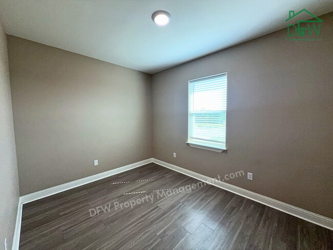 Building Photo - Spacious 4-Bedroom Corner Home - 2-Car Garage, Fenced Yard