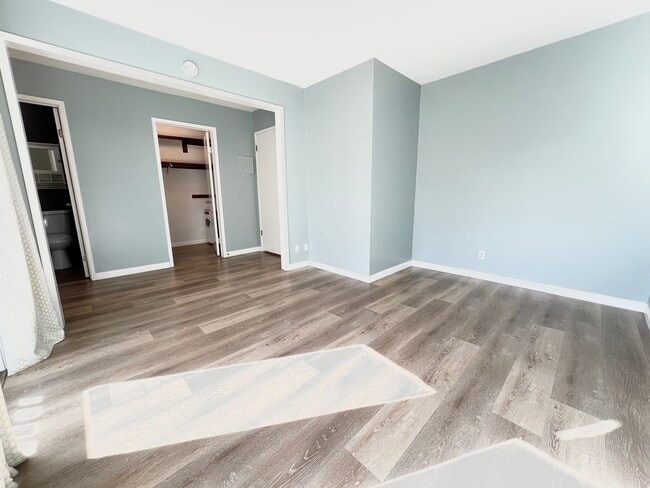 Building Photo - Contemporary 2 Bed Condo with 2 Garage Parking Spaces, Community Pool, and 3 Private Balconies