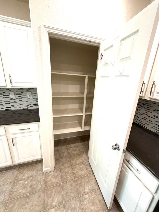 Building Photo - Spacious 5BR + Loft in Hamptons Village – Studio Suite, New HVAC, EV Charging