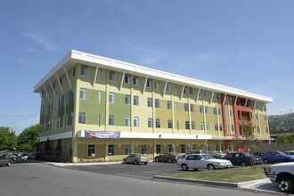 Building Photo - Miley Gardens at Eastmont- 55+ Senior Affordable Community