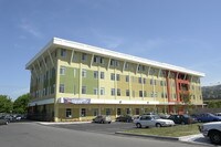 Building Photo - Miley Gardens at Eastmont- 55+ Senior Affo...