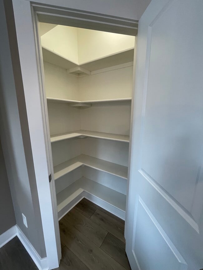 Walk in Pantry with Wood Shelves - 1730 Chief Okemos Cir