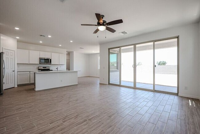 Building Photo - HOME IN LAVEEN! 4 BED 3.5 BA 3 CAR GARAGE!...
