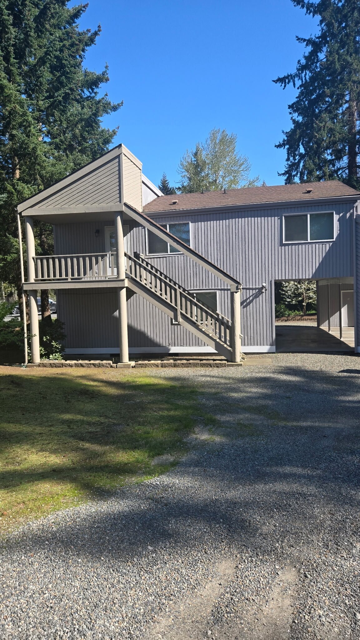 Tree-lined 3 unit apartment building with attached carport in beautiful Normandy Park! - 20005 1st Ave S