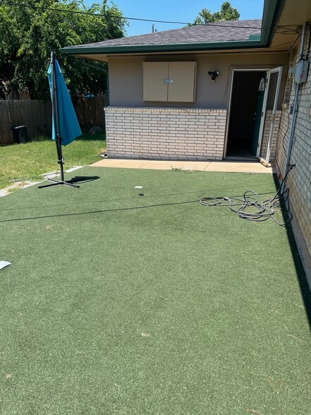 Patio w/space outside TV Cabinet - 11013 N Brauer Ave