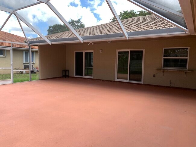 Building Photo - 9840 NW 28th Ct