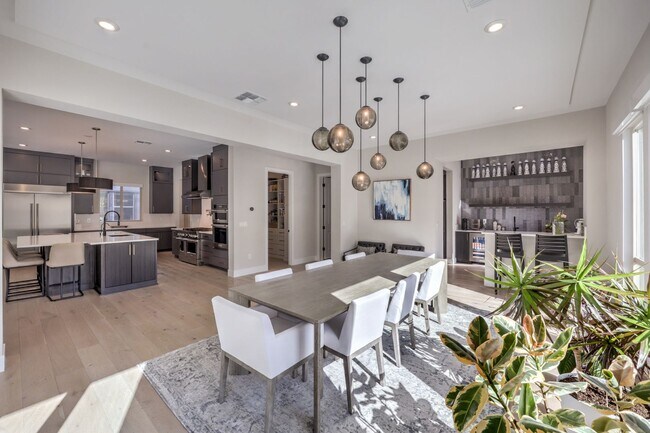 Building Photo - Exquisite 6-bed/ 6-bath residence nestled within the prestigious, guard-gated community of Revere...