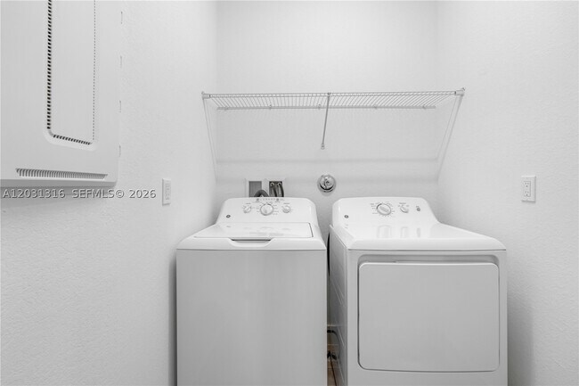 Building Photo - 7305 Ivory Spring The Luminosa