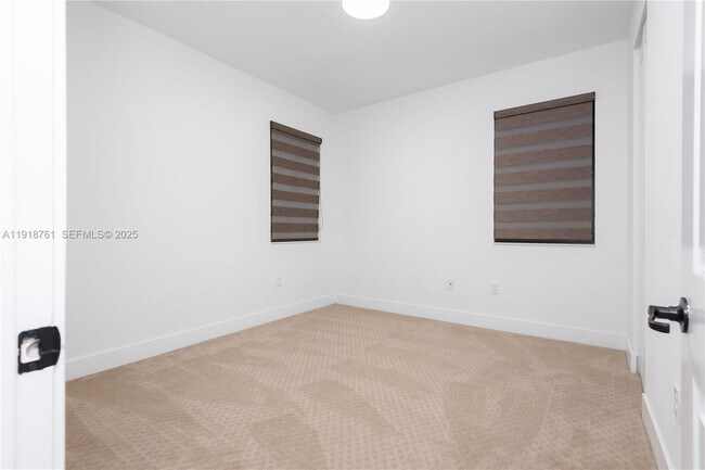 Building Photo - 9735 W 34th Ct