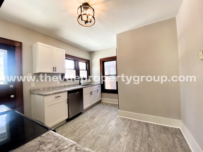 Building Photo - 3BR Beauty with Hardwood Floors + Remodeled Kitchen + Fenced Yard!