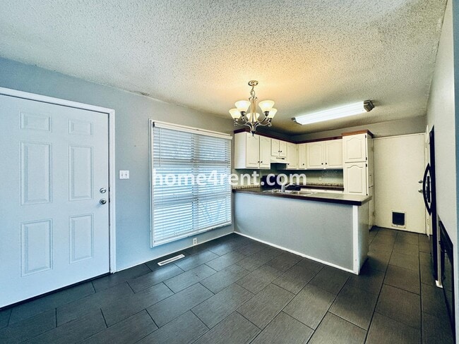 Building Photo - Charming Ranch Style, Prairie Village Home w/ a Fenced Yard, Updated Baths, and All Appliances In...