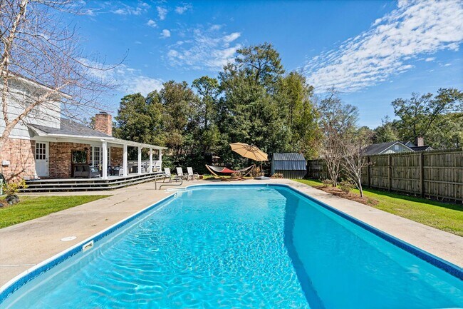 Building Photo - Spacious 4-Bedroom Home with Pool, Two Pri...