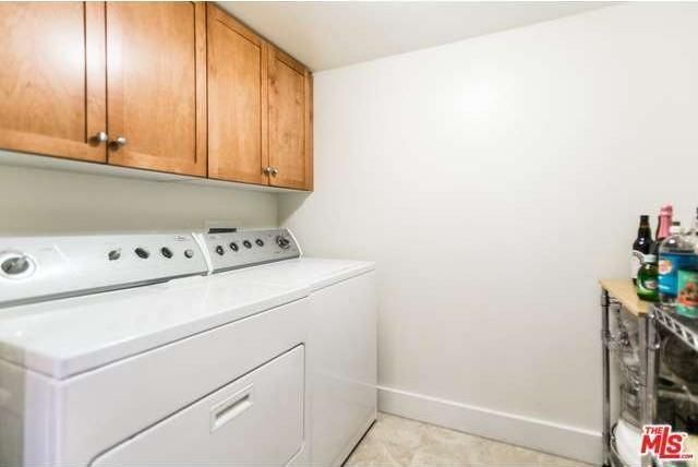 Full size washer and dryer in room off kitchen - 1951 N Beachwood Dr