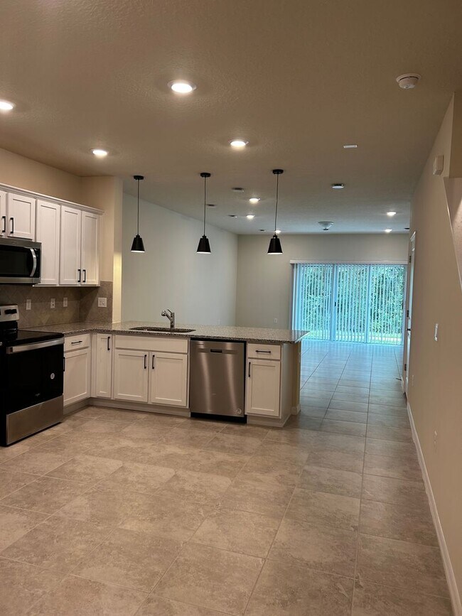 Building Photo - Move In ASAP!! - Brand New 3 bedroom 2.5 bath Townhouse for rent in Kissimmee, FL.
