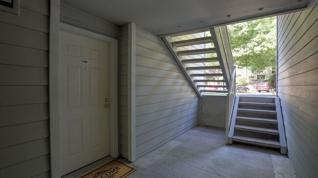 Building Photo - This ground floor corner-unit condo