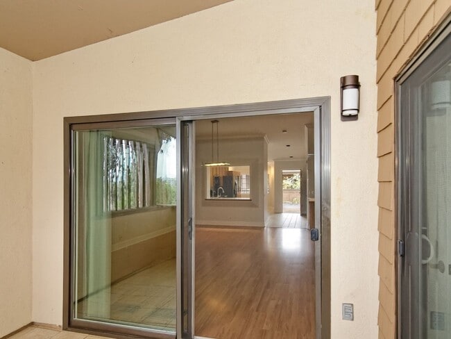 Building Photo - Water, Sewer, Trash Included! Fireplace, Washer, Dryer, 2 Assigned Parking, Garage, Open Floor Pl...