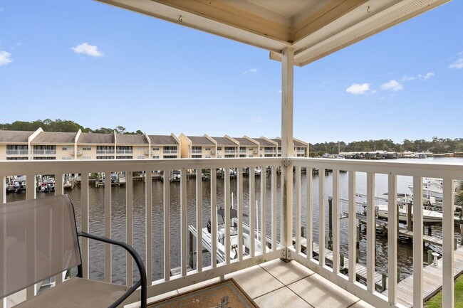 Building Photo - Welcome to Coastal Living at Harbor Landing Condominiums!